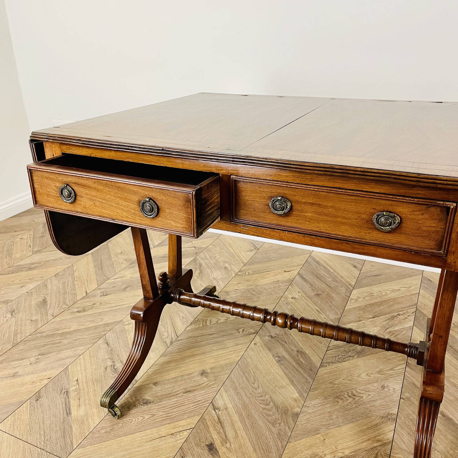 Antique English Mahogany Drop Leaf Stretcher Table On Castors, 19th Century photo for sale