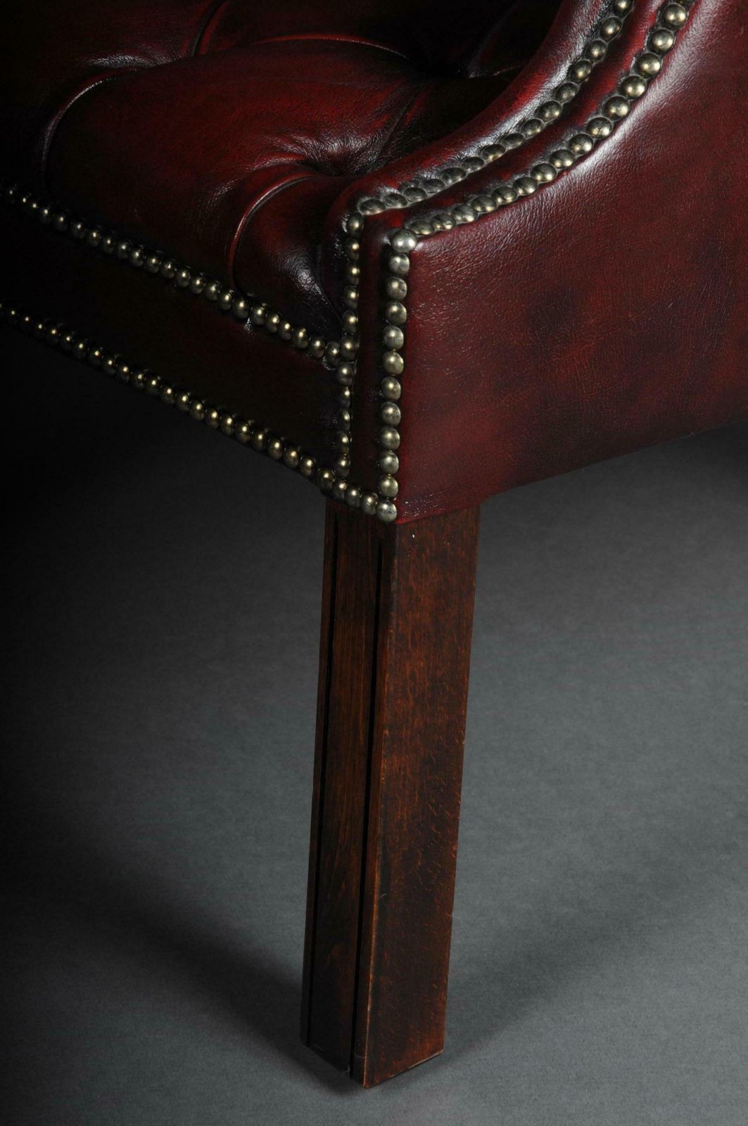photo furniture 20th Century Classic English Chesterfield Earsback Chair, Leather