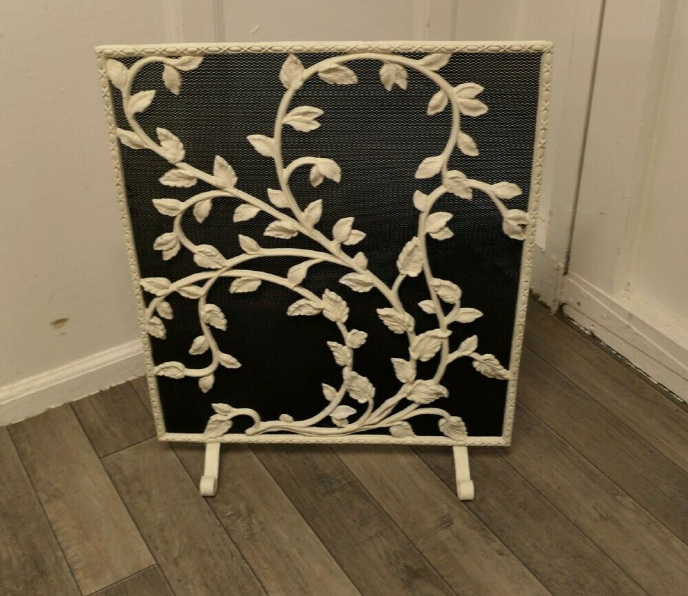 Painted Wrought Iron Fire Guard Decorated With Leaves photo for sale