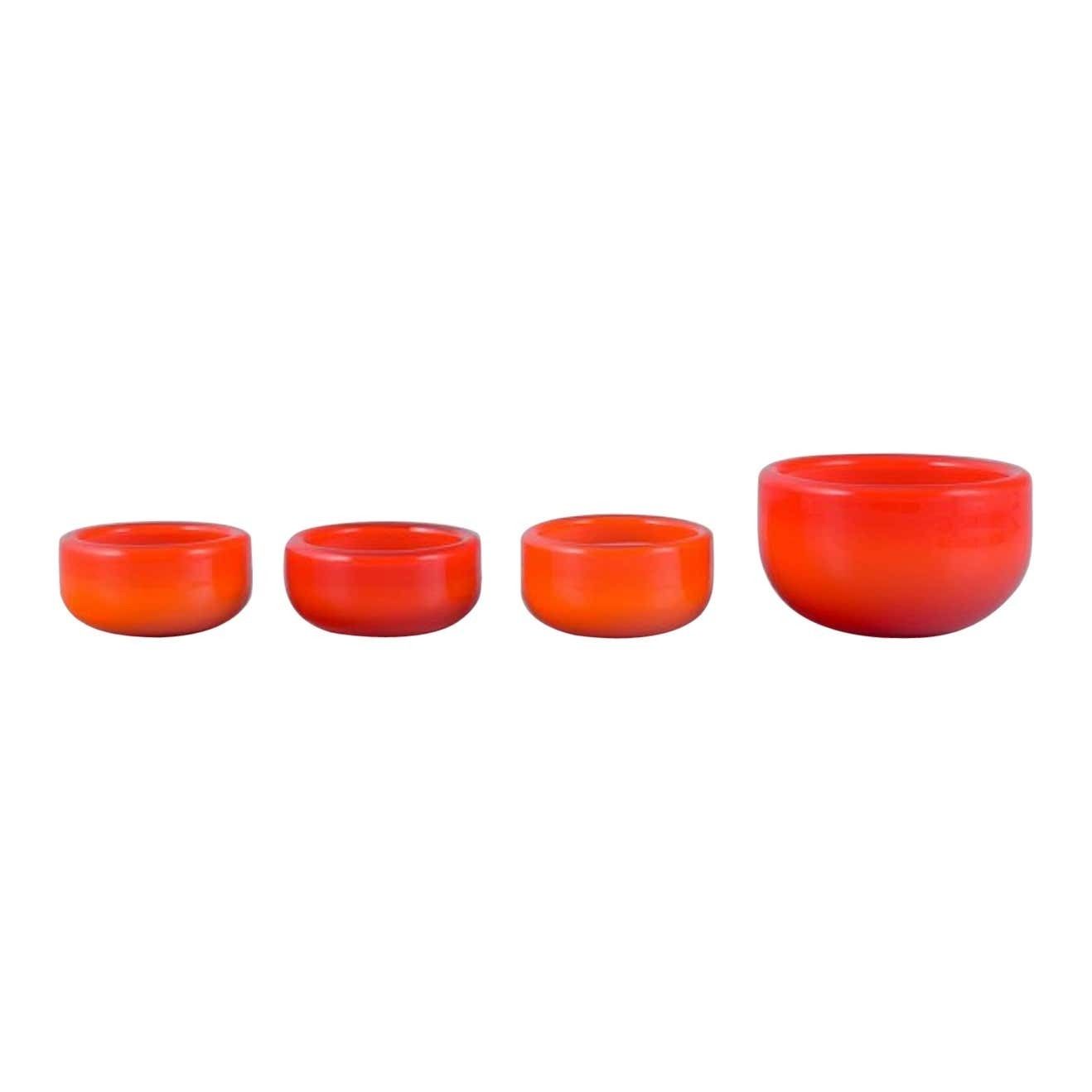 Michael Bang For Holmegaard, Four Glass Bowls In Orange And White Art Glass
