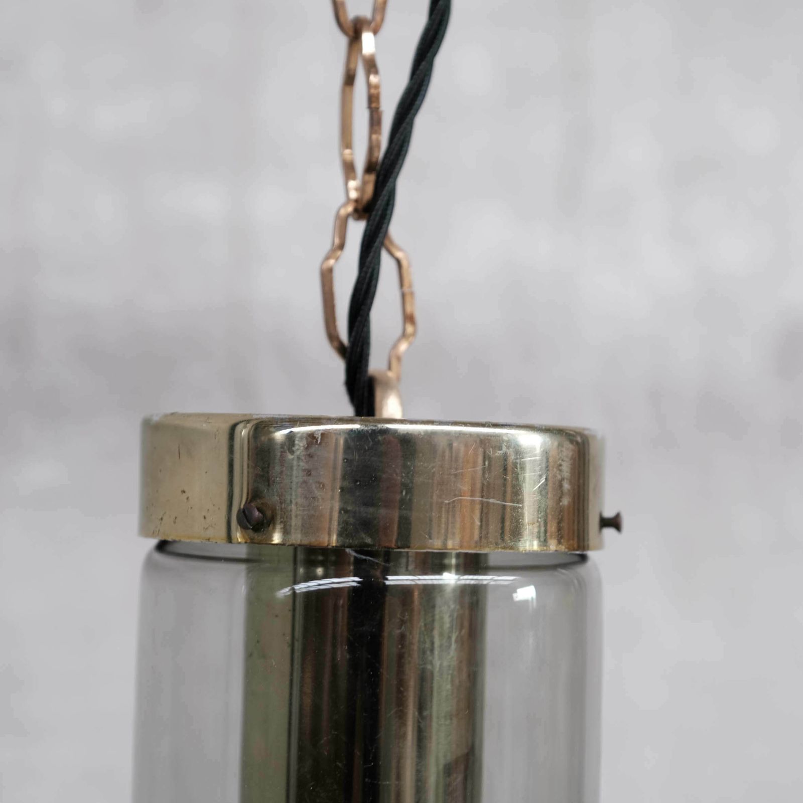 Large Smoked Mid Century Glass And Brass Pendant Lights By Raak (2 Available) photo for sale
