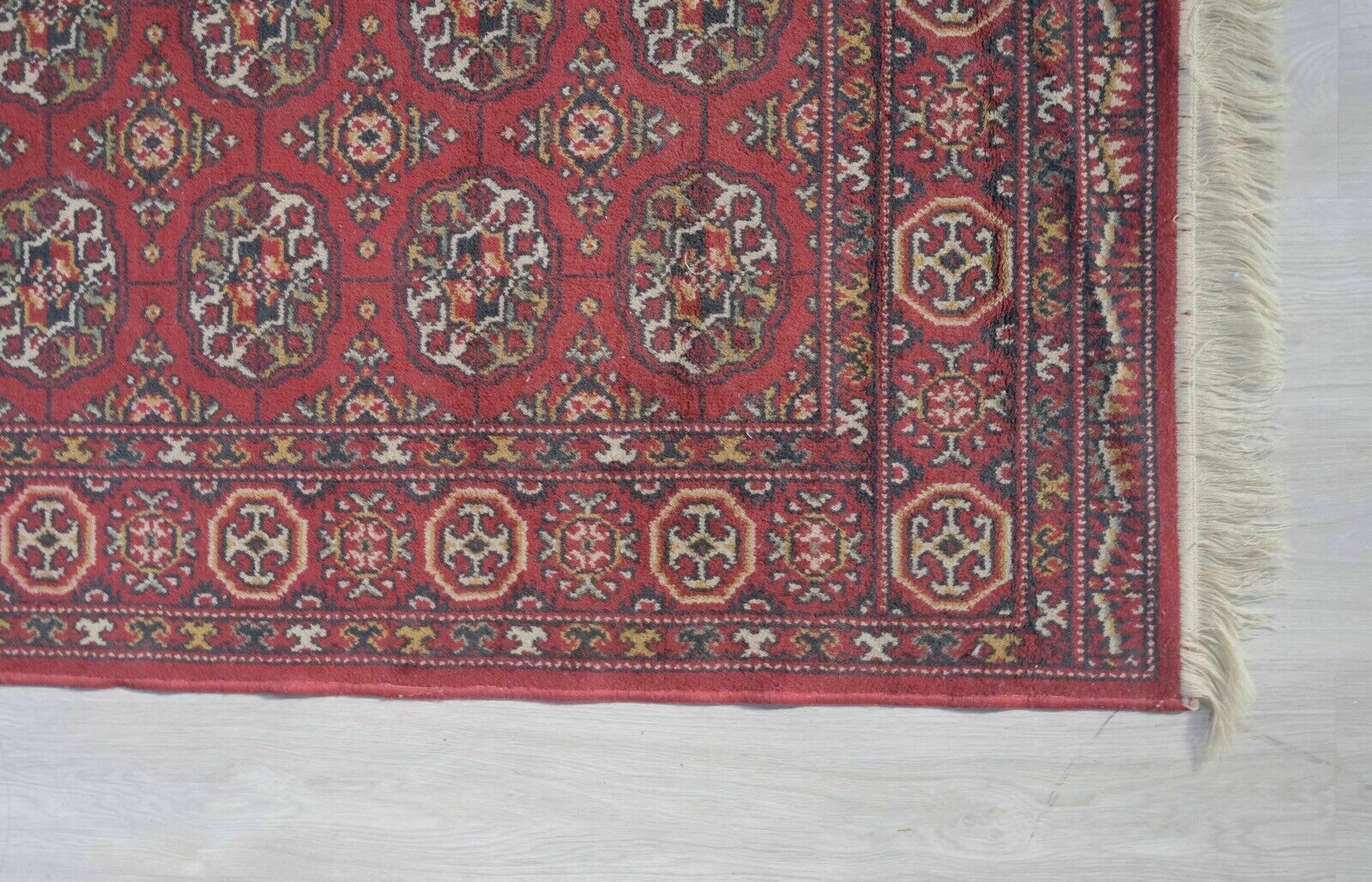 Medium Size Due Palme Zenit Wool Carpet Red With Fringes photo Textiles