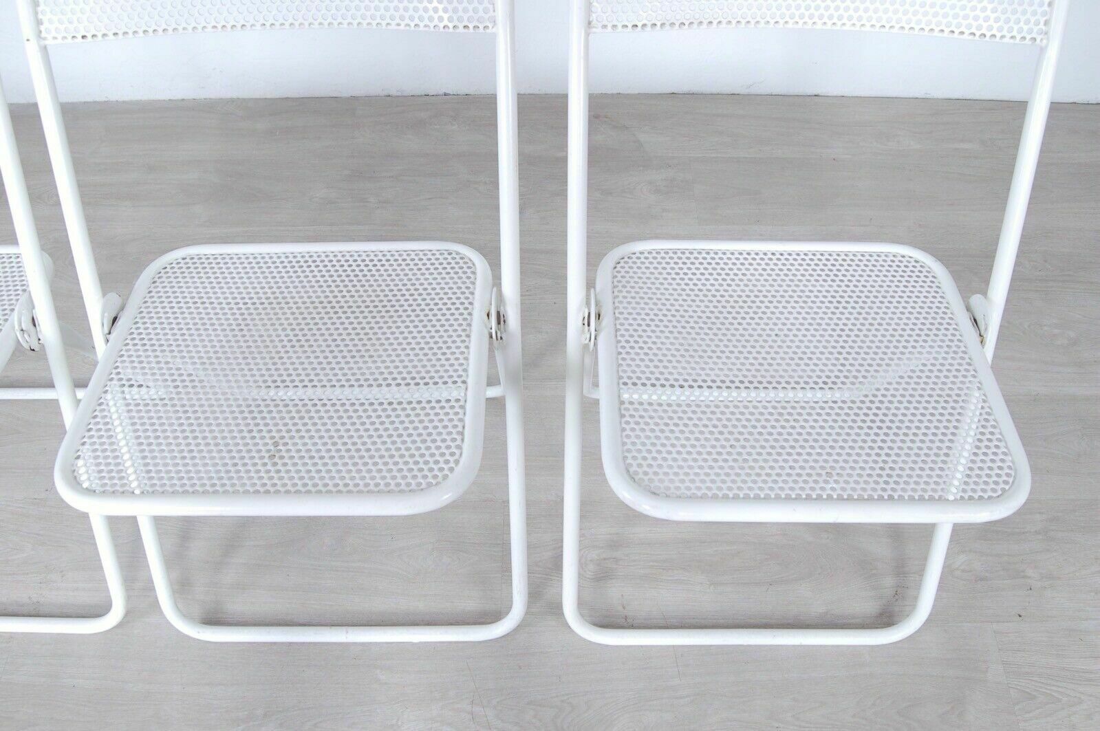 3 Vintage Folding Chairs In Perforated White Enamelled Iron Bar From The 60s And 70s photo vinterior