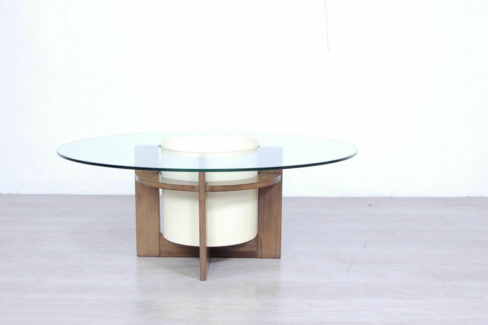 Round Coffee Table Design From The 70s With Giano Artemide Vase Holder photo furniture