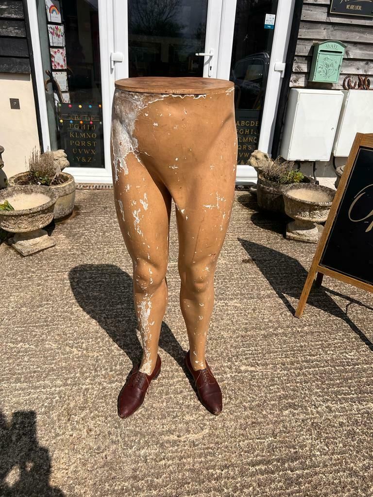 A Fantastically Kooky Plant Stand Made From Vintage Mannequin Legs photo furniture