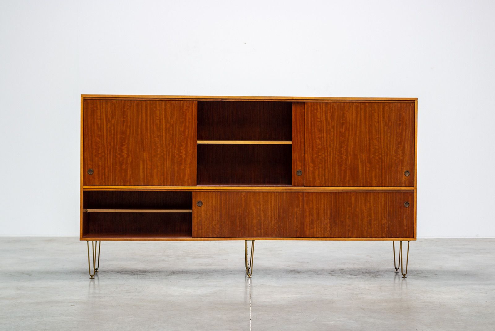 photo furniture Alfred Hendrickx 1950 Sideboard With Brass Hairpin Legs