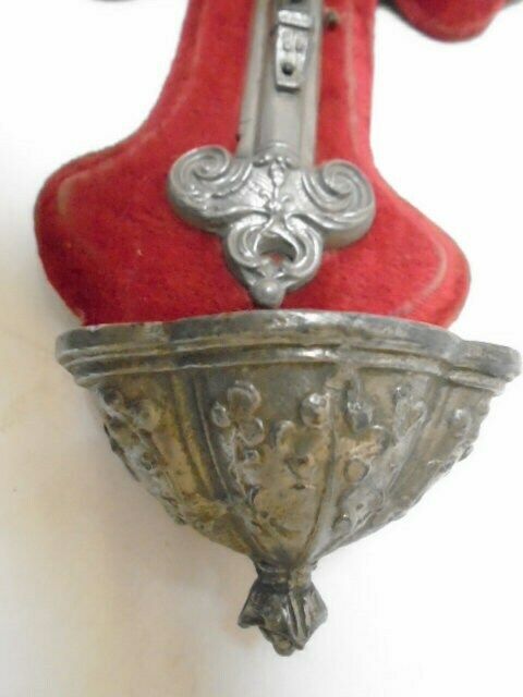 photo furniture Antique French Benitier With Silver Tone Crucifix On Timeworn Red Velvet