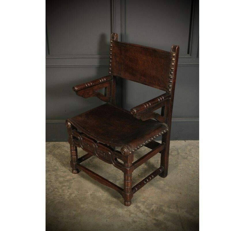 1070.55 Pair Of Oak And Leather Armchairs photo