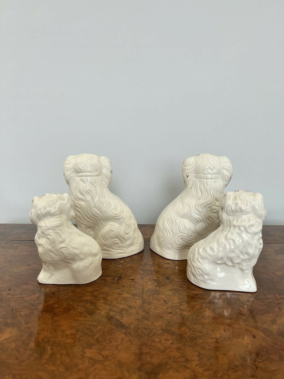 Collection Of Four Quality Royal Dolton Seated Spaniels photo for sale