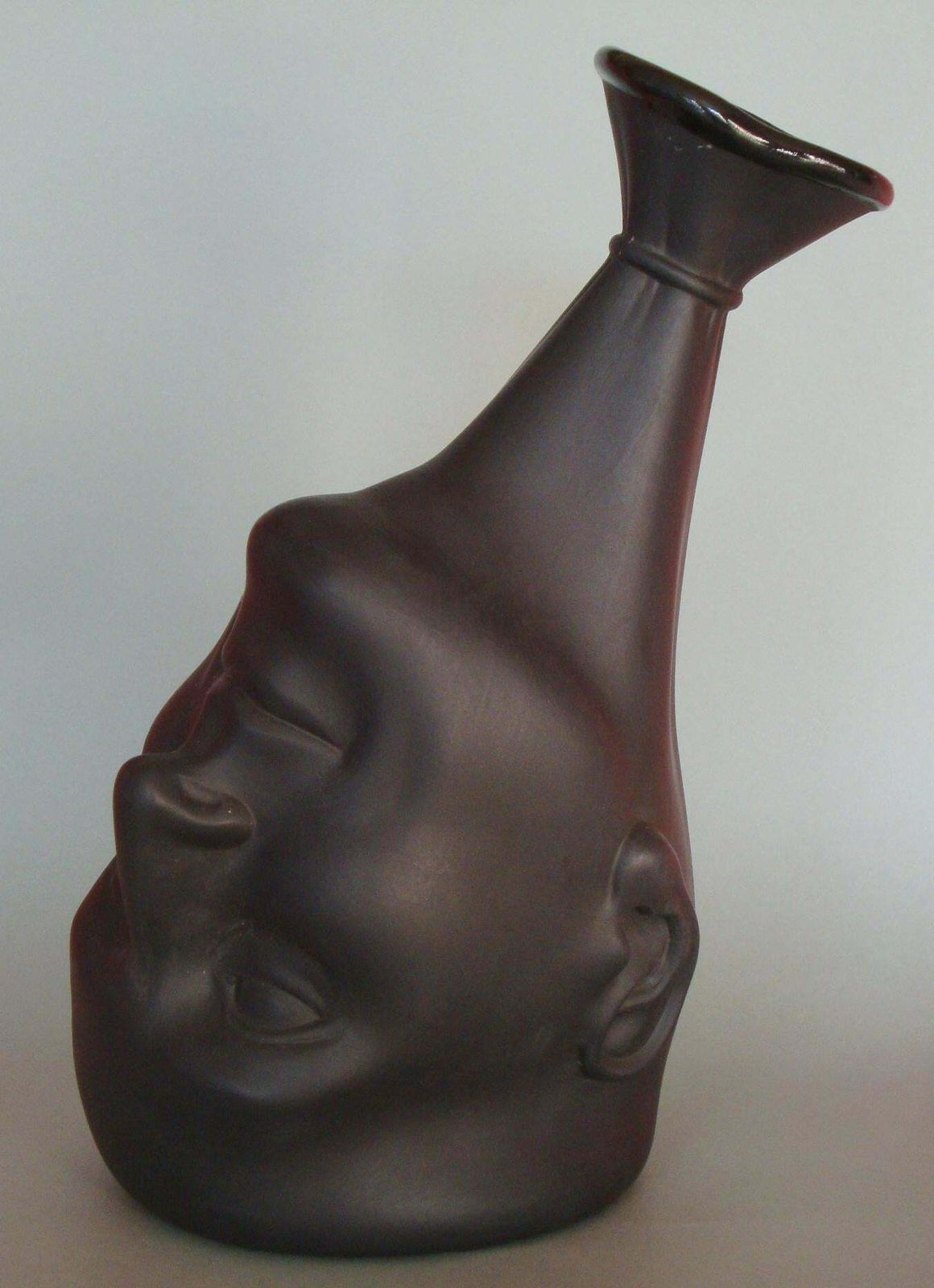 Ilona Romule Vase. A Man's Head (Black) Porcelain photo for sale