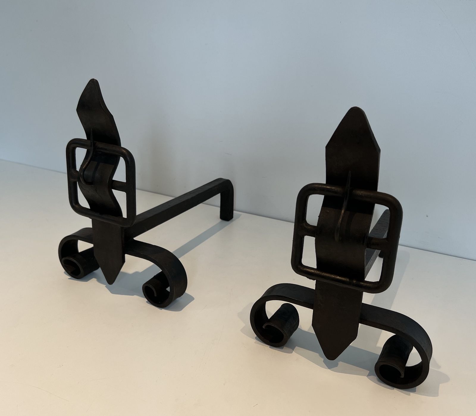 Pair Of Modernist Cast Iron And Wrought Iron Belt Andirons photo for sale