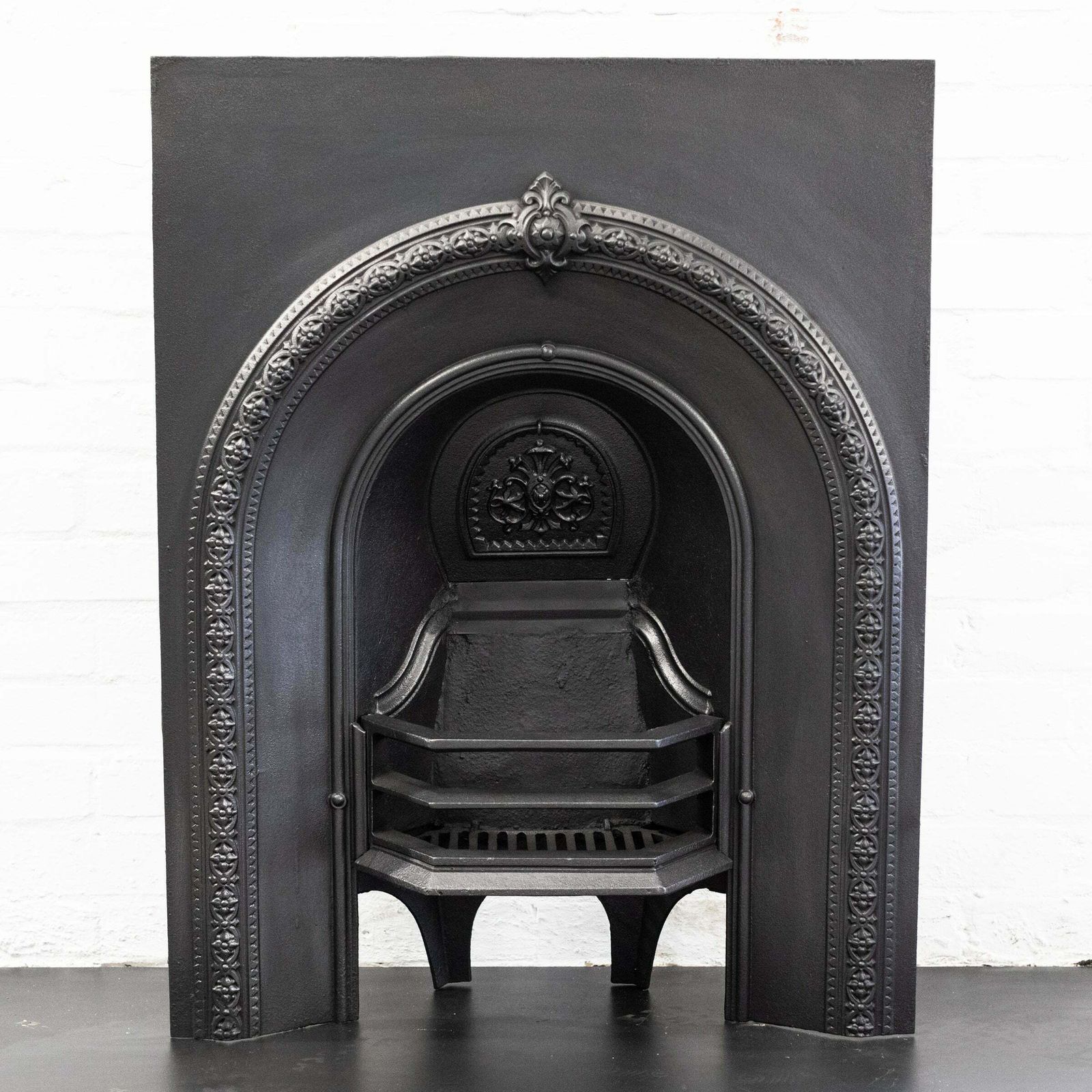 photo furniture Antique Cast Iron Arched Fireplace Insert