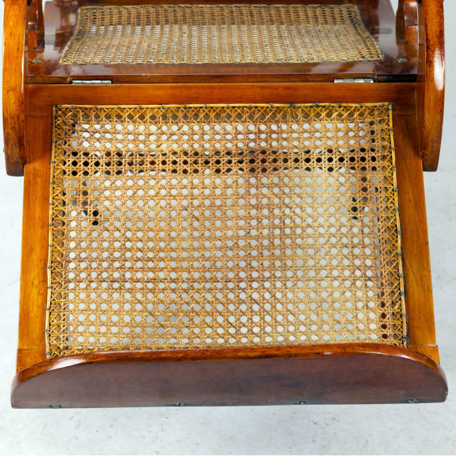 1716.0 19th Century Biedermeier Reclining Cane Chair photo