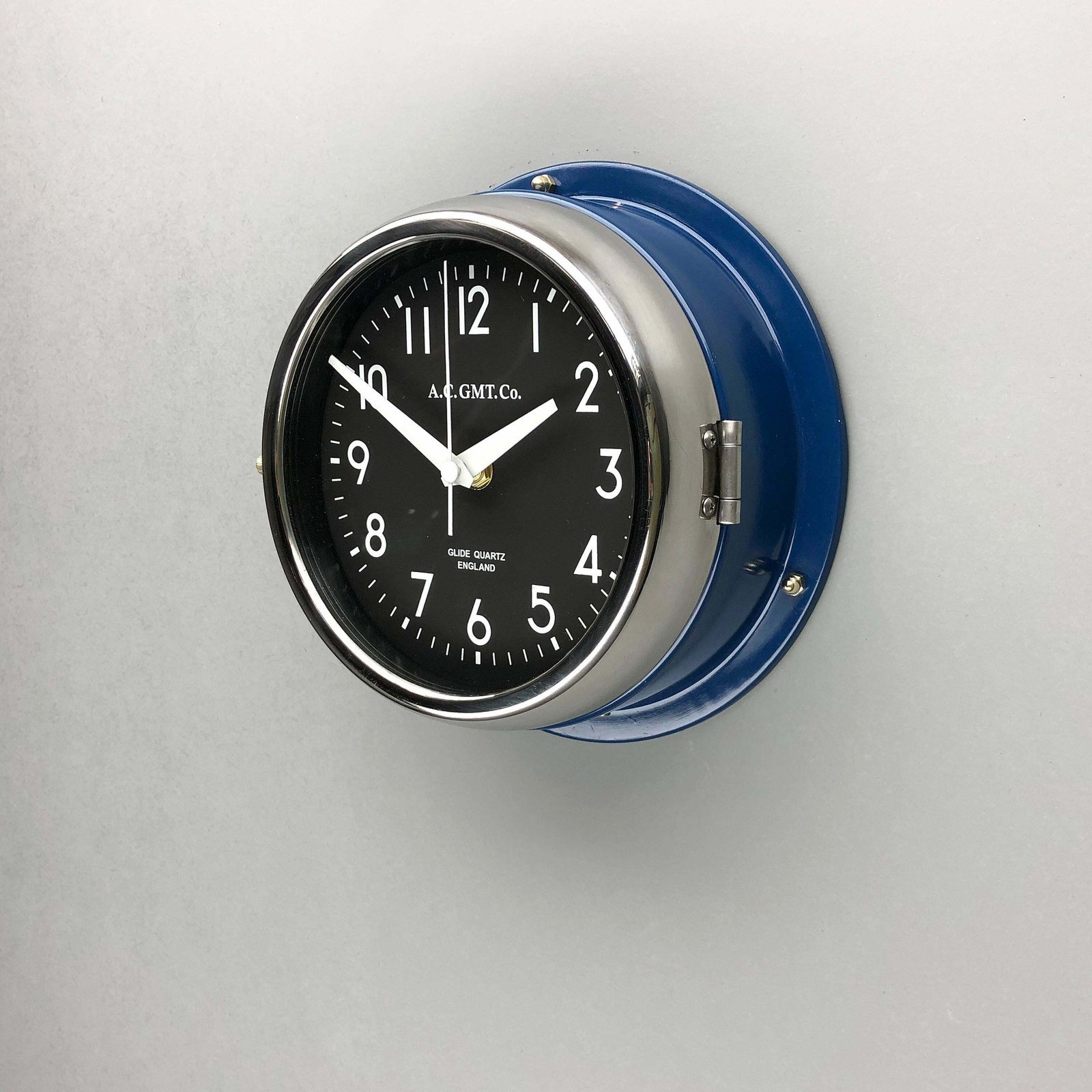 photo furniture 1970s British Classic Blue & Chrome Ac.Gmt.Co. Industrial Wall Clock Black Dial