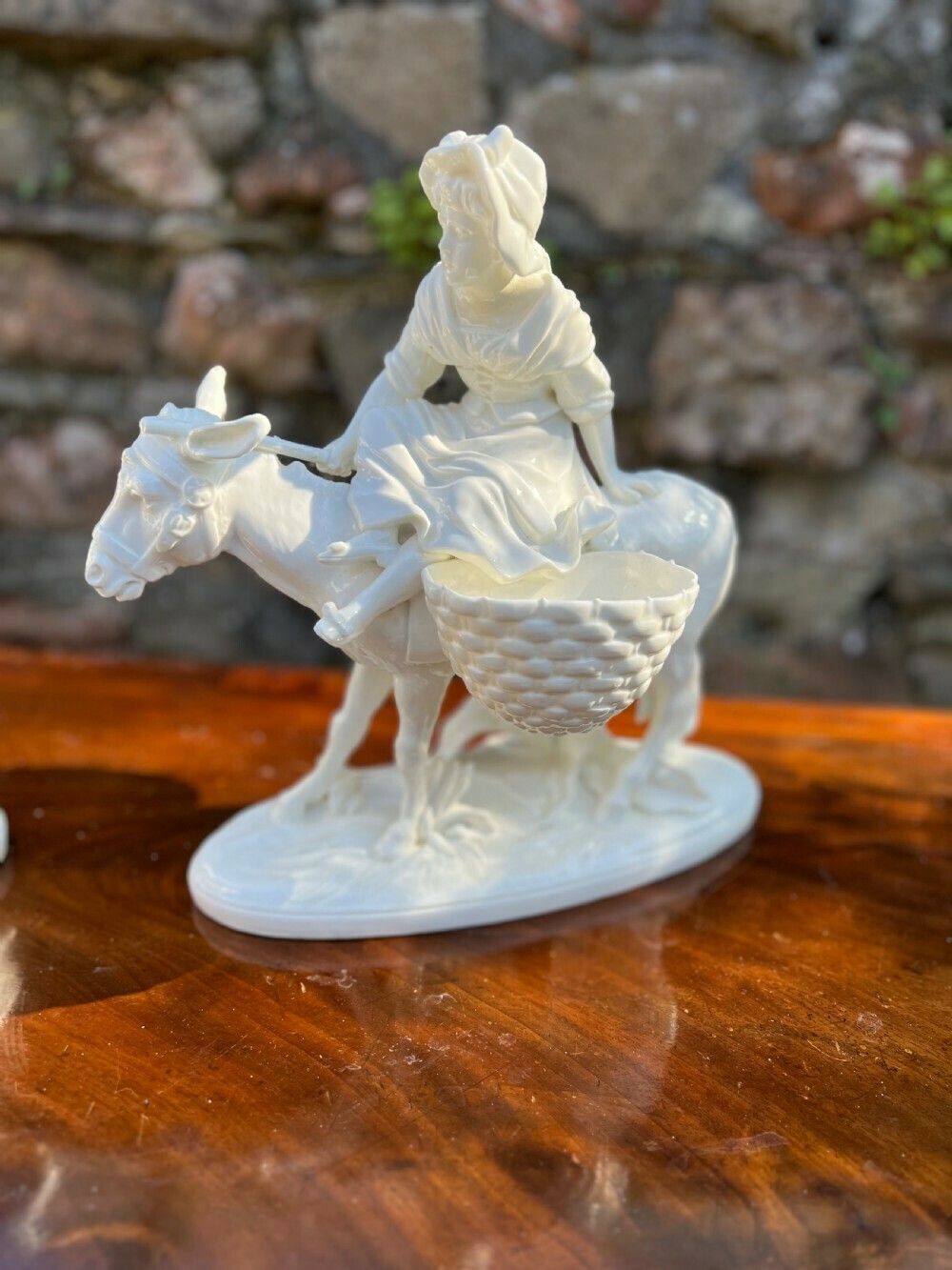 Pair Of Porcelain Figures By Moore Bros, Depicting A Man And A Woman Riding Donkeys photo furniture
