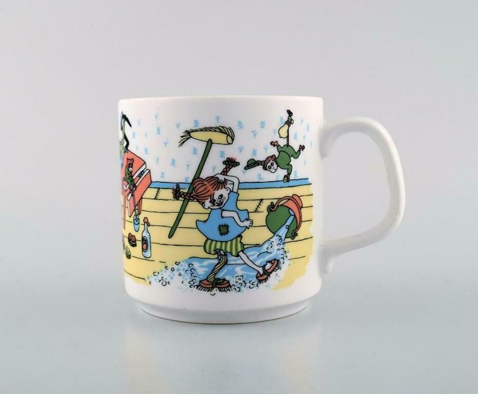 Rörstrand, Four Cups And A Plate In Porcelain With Pippi Longstocking Motifs photo 328.0