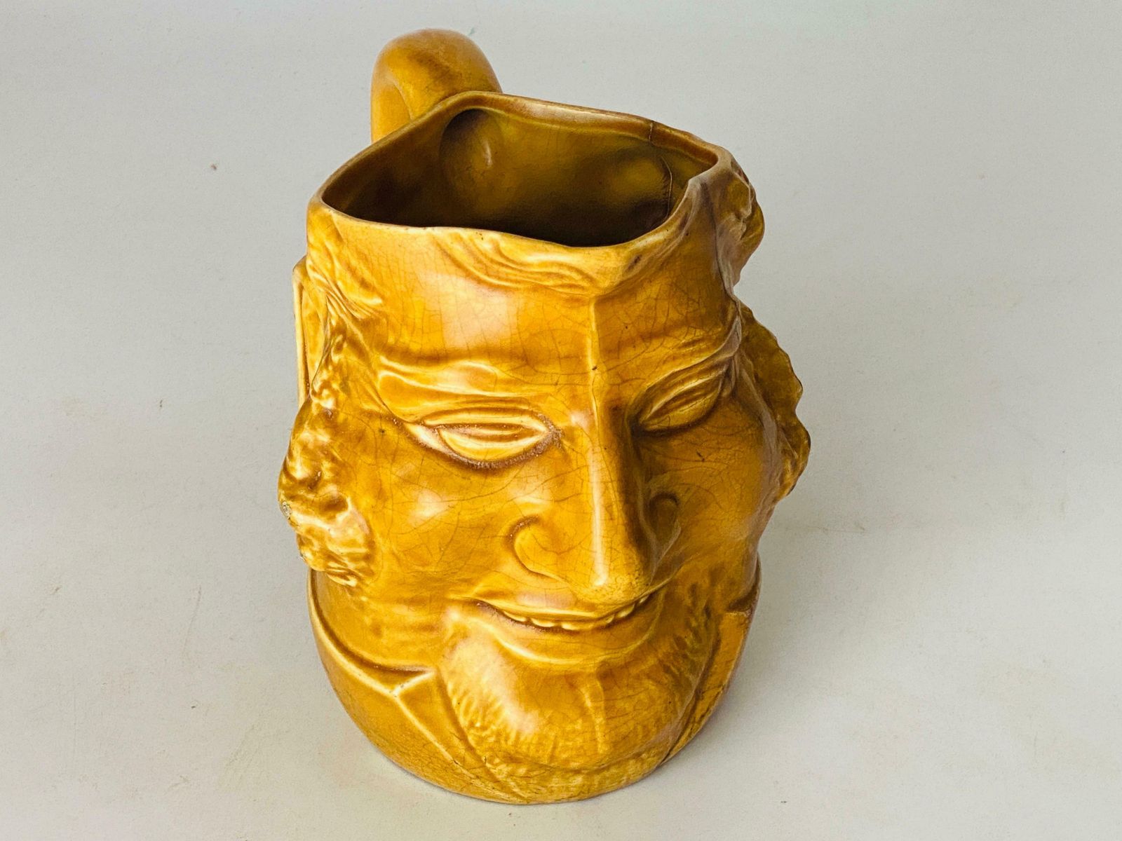 photo for sale Pitcher In Ceramic From France Yellow Colour Shape Man Face France 1970
