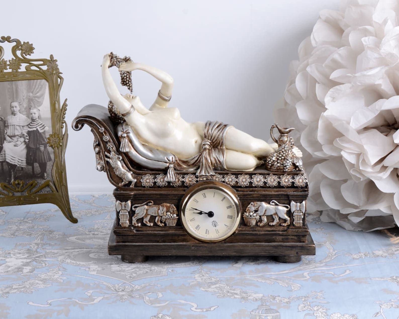 Antique Still Decorative Mantel Clock In The Romantic Art Nouveau Style. photo furniture