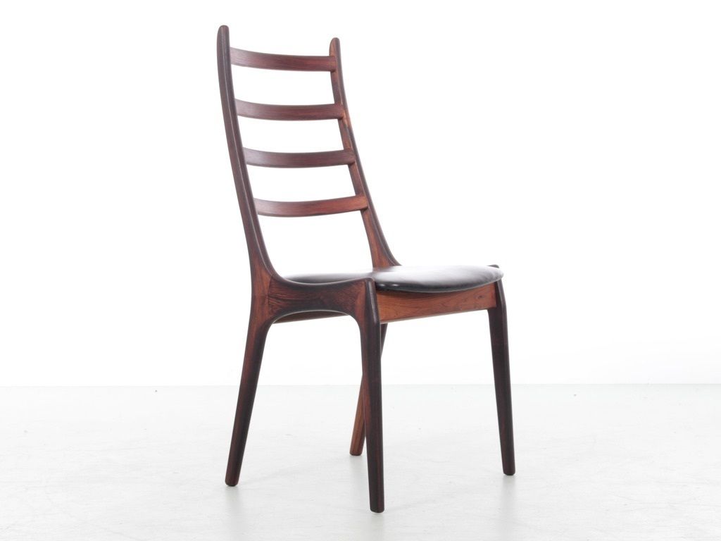 Mid Century Modern Scandinavian Set Of 4 Rosewood Chairs By Henning Kjærnulf. photo for sale