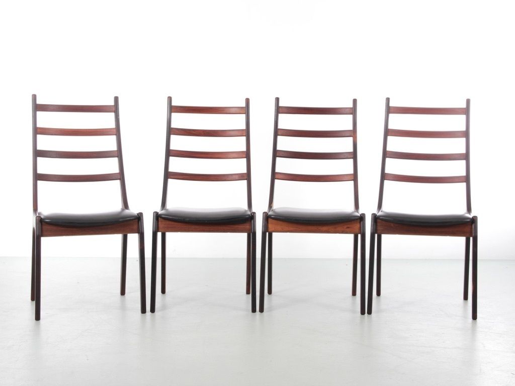 Mid Century Modern Scandinavian Set Of 4 Rosewood Chairs By Henning Kjærnulf.