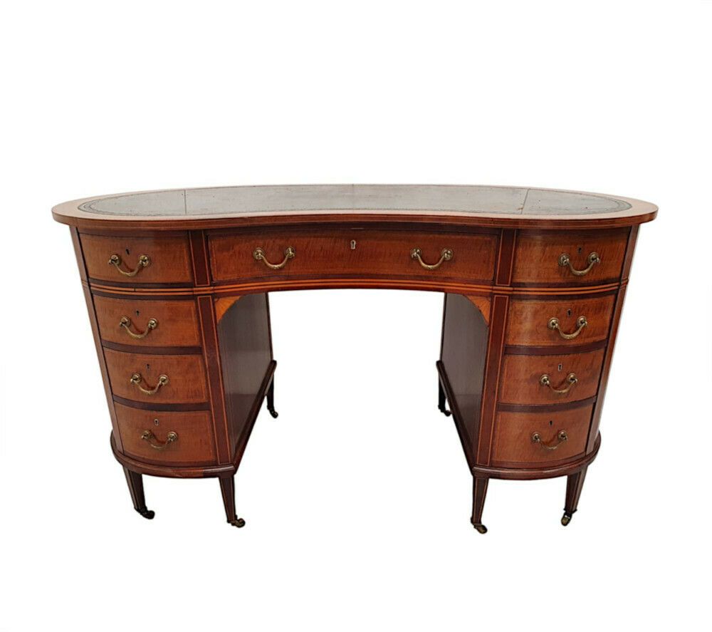 A Very Fine Edwardian Leather Top Kidney Shaped Desk