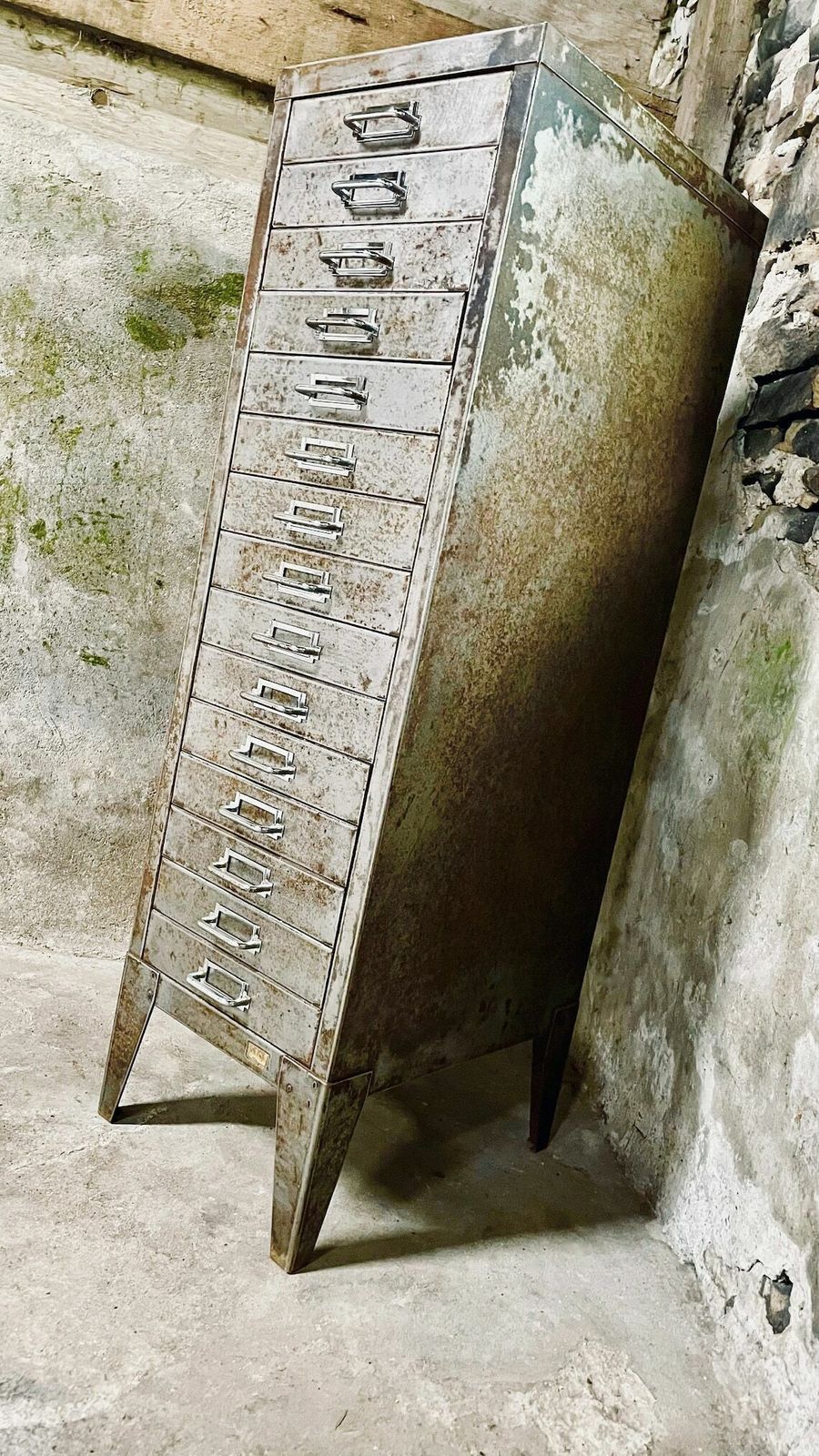 photo furniture Tall And Narrow Reclaimed Vintage Urban Industrial 1950s Stripped Steel 15 Drawer Filing Cabinet With Chrome Handles