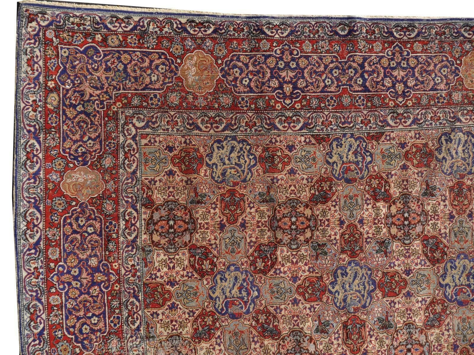 photo vintage Antique Dragon Rug Hand Knotted In Hereke Turkish Carpet