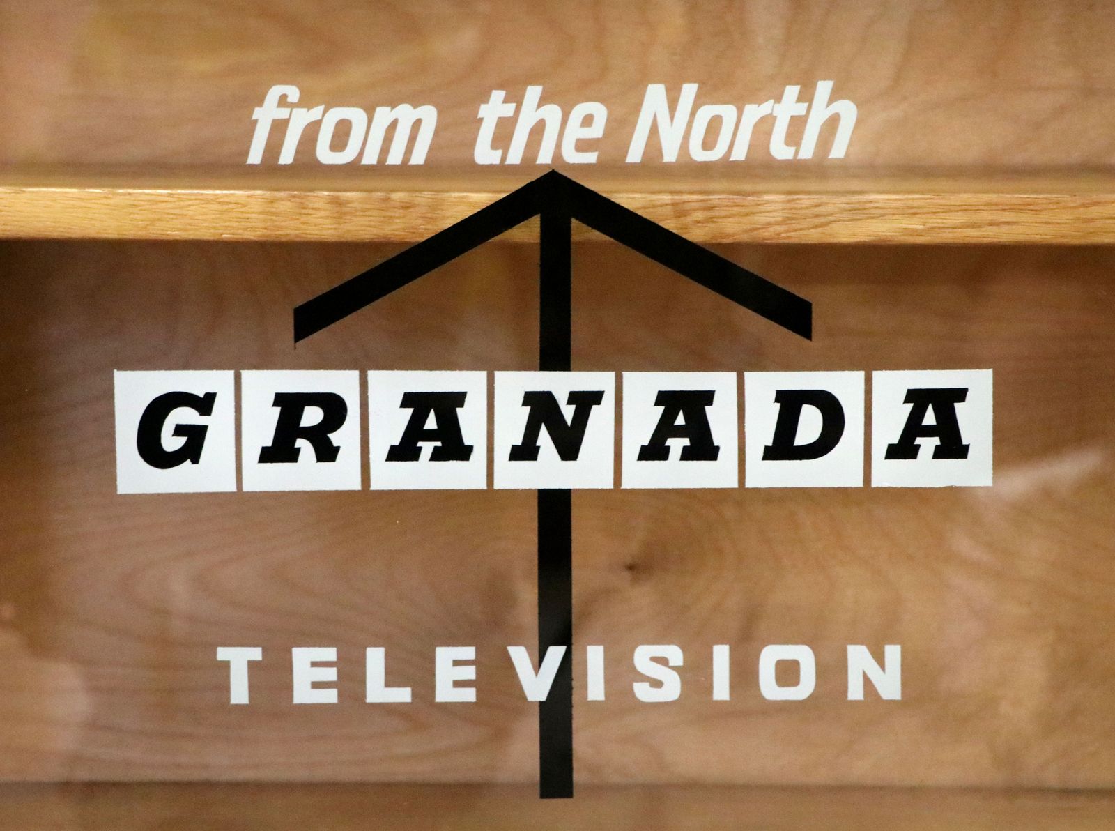 595.0 A Mid Century Light Oak Veneered Bookcase Later Sign Written For The Granada Television photo