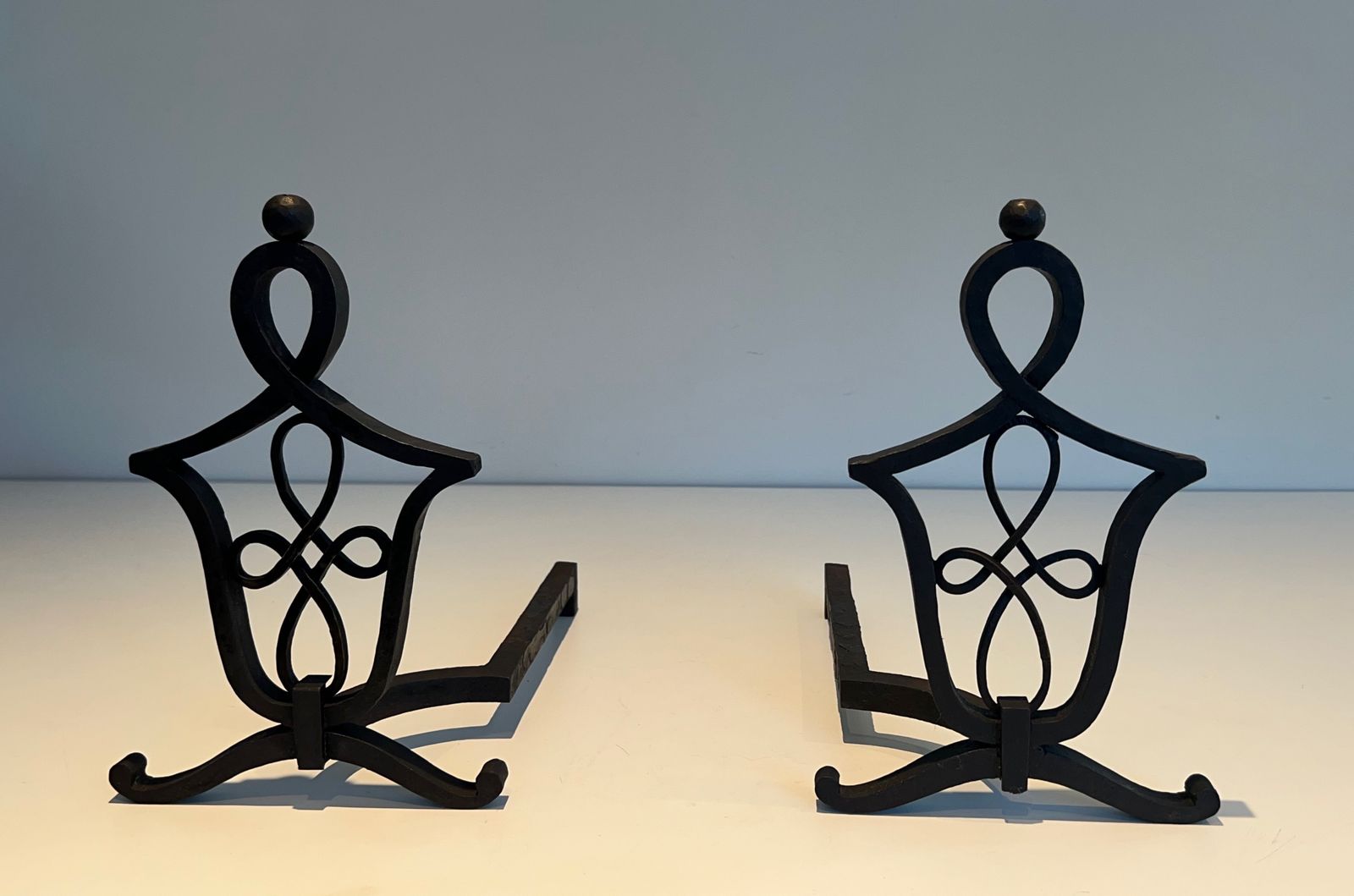Pair Of Wrought Iron Andirons In The Style Of Raymond Subes photo for sale