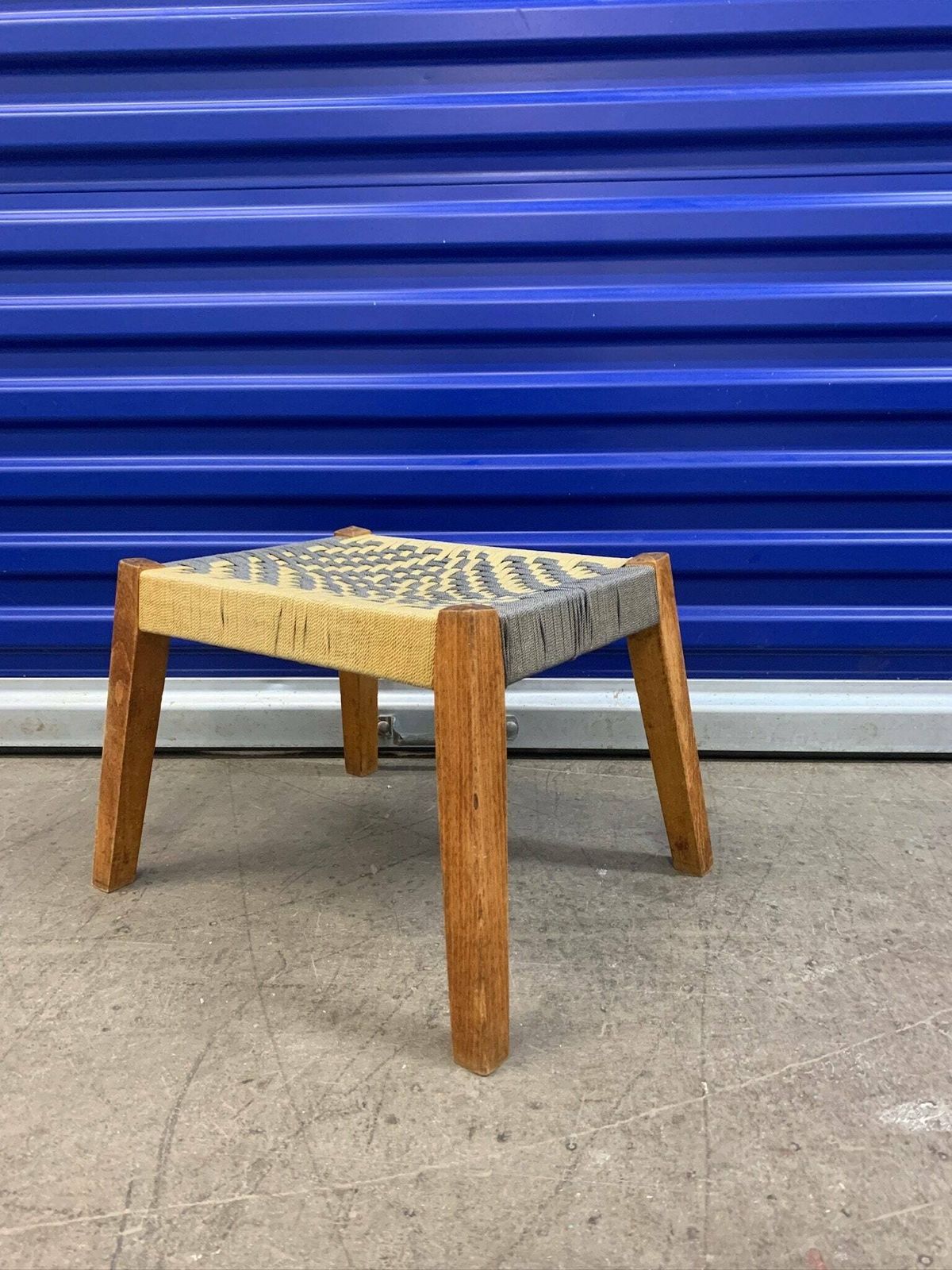 Cute Little Footstool With Woven Rope Seat And Slanted Legs