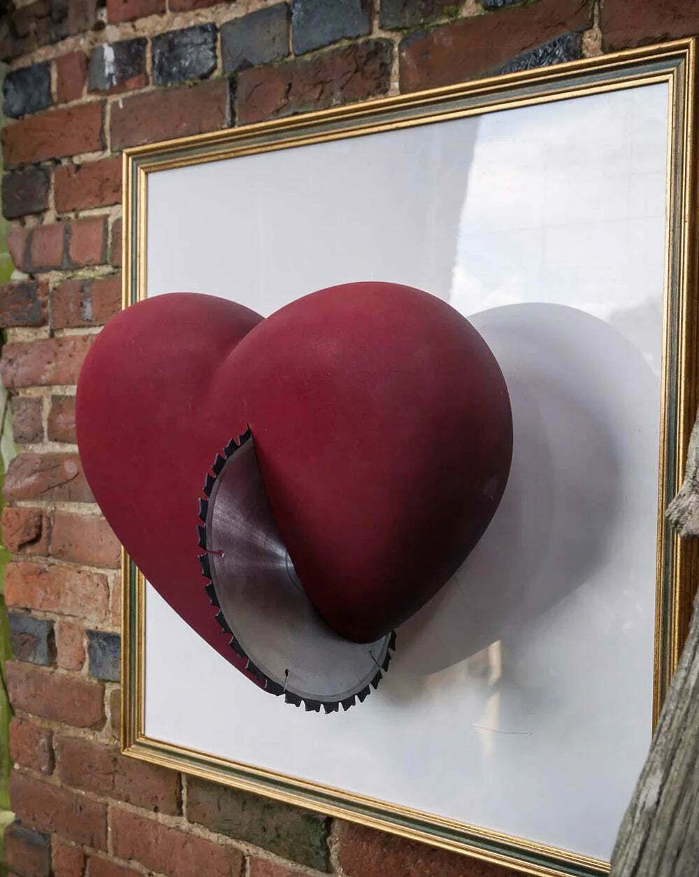 The First Cut Unique Wall Mounted Resin Sculpture With Steel Blade Mounted On A Frame
