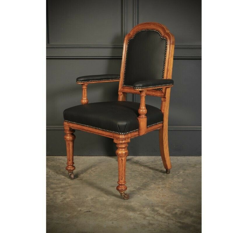 3700.71 Pair Of Gothic Oak & Leather Chairs By W.Williamson & Sons. photo