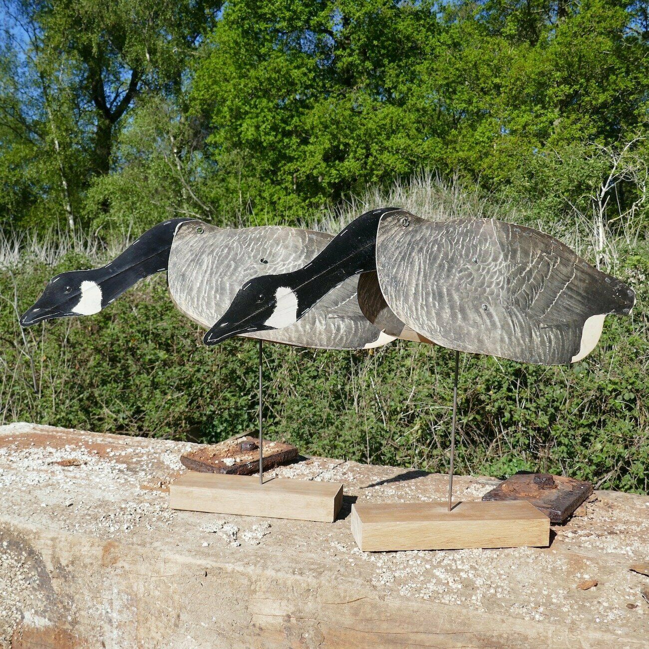 A Pair Of Feeding Folding Geese Decoys photo furniture