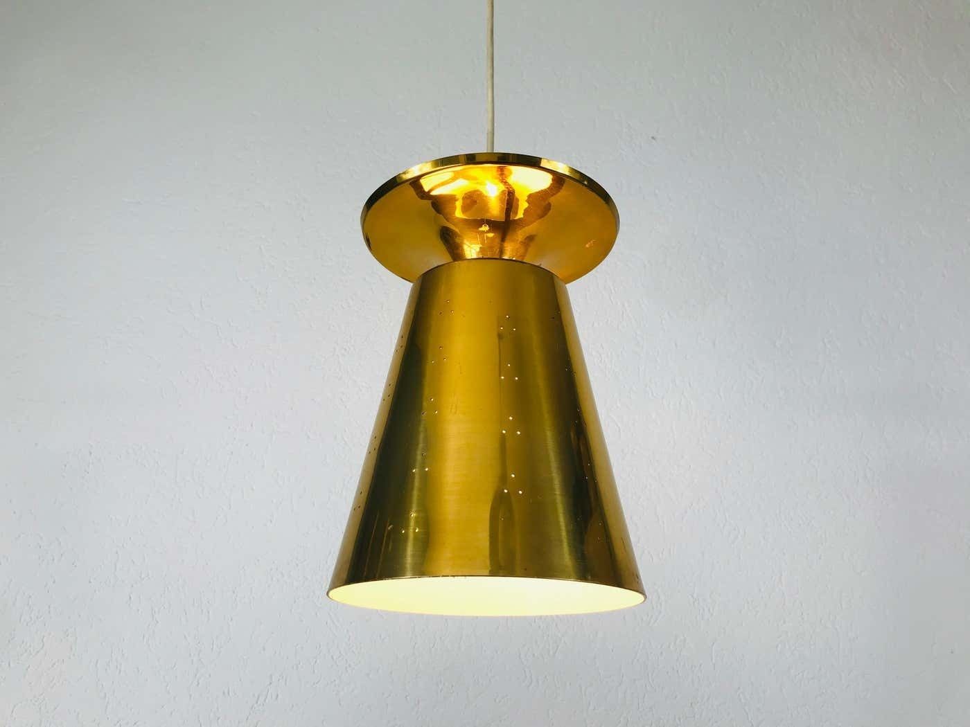 Set Of 3 Polished Brass Pendant Lamps Attributed To Paavo Tynell, 1950s photo buy