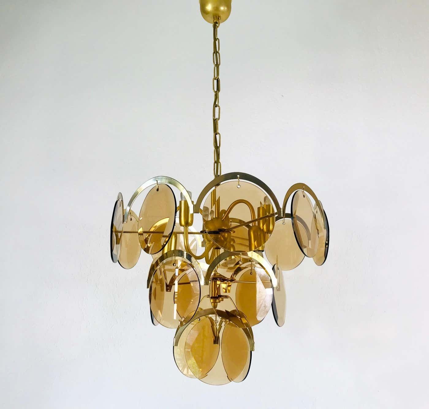 Lighting Midcentury Three Tier Brass And Glass Chandelier By Vistosi, 1960s photo