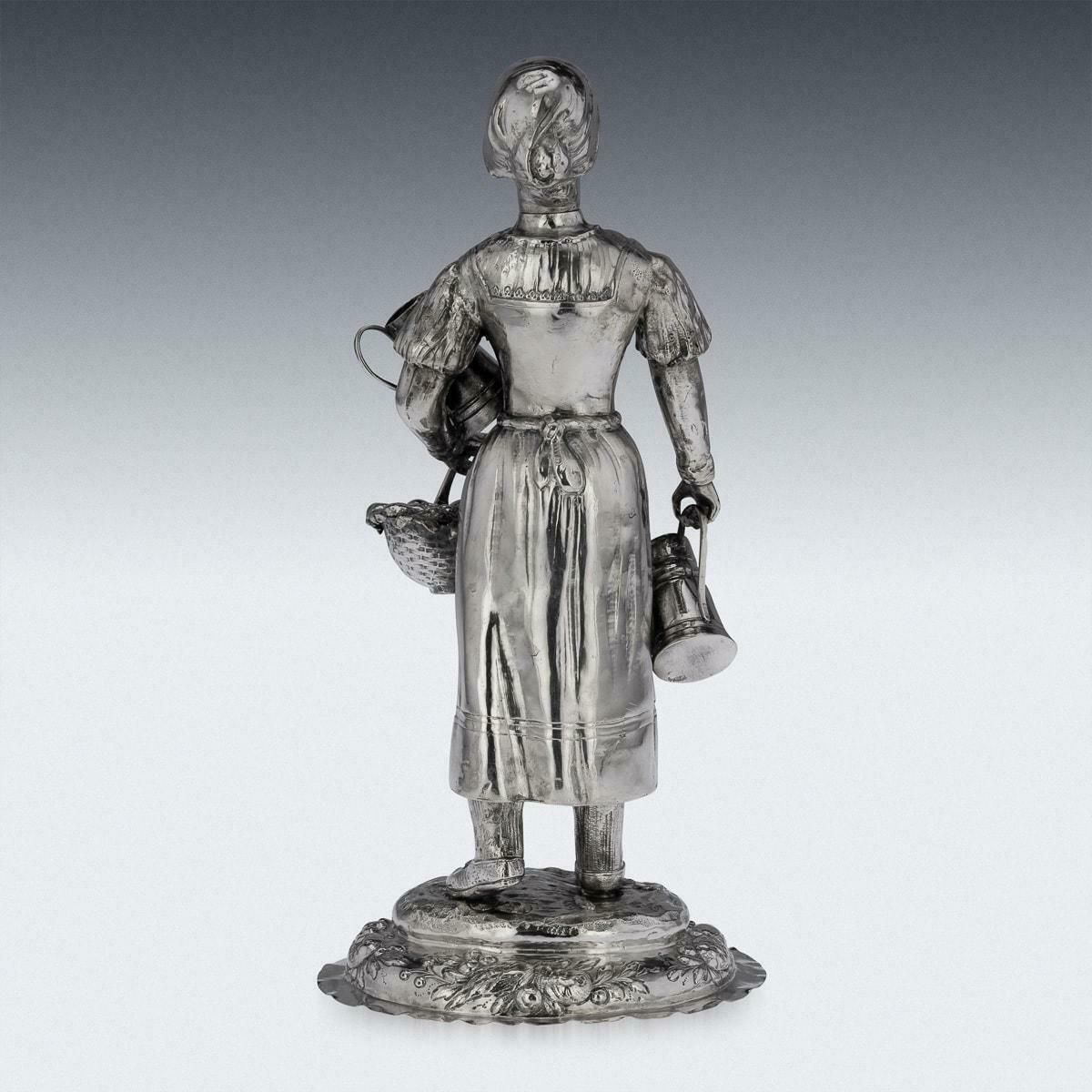 photo furniture 19th Century German Solid Silver Figure Of A Fruit Seller, C.1880