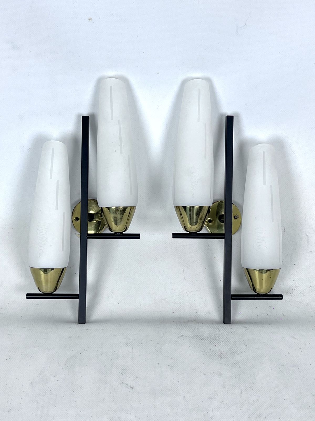 Mid Century Pair Of Double Lights Sconces In Brass And Opaline Glass. Italy 1950s