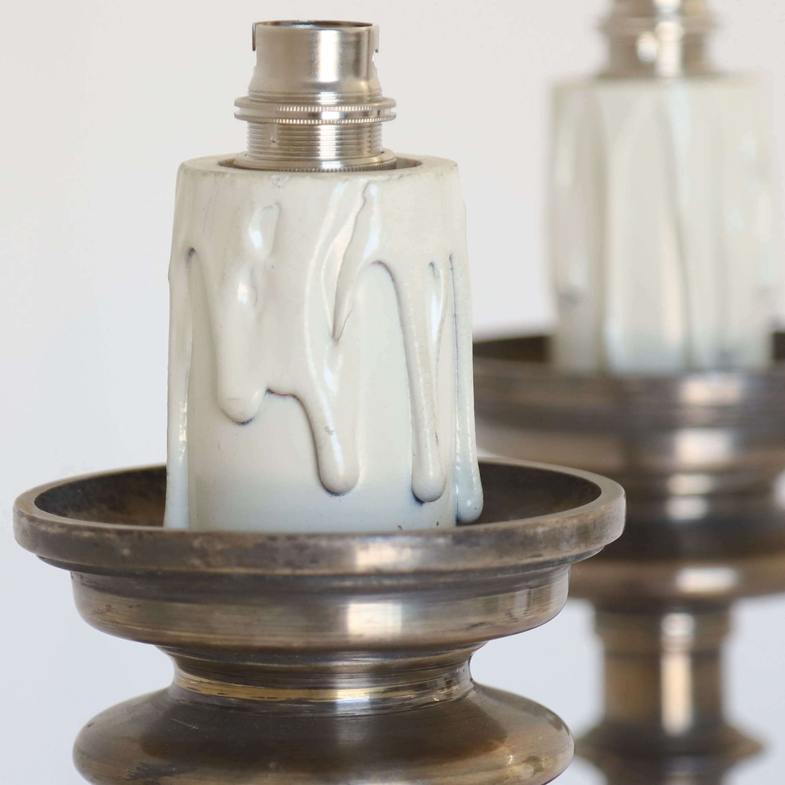 photo furniture Pair Of Silvered Brass Candlesticks Later Converted To Lamps