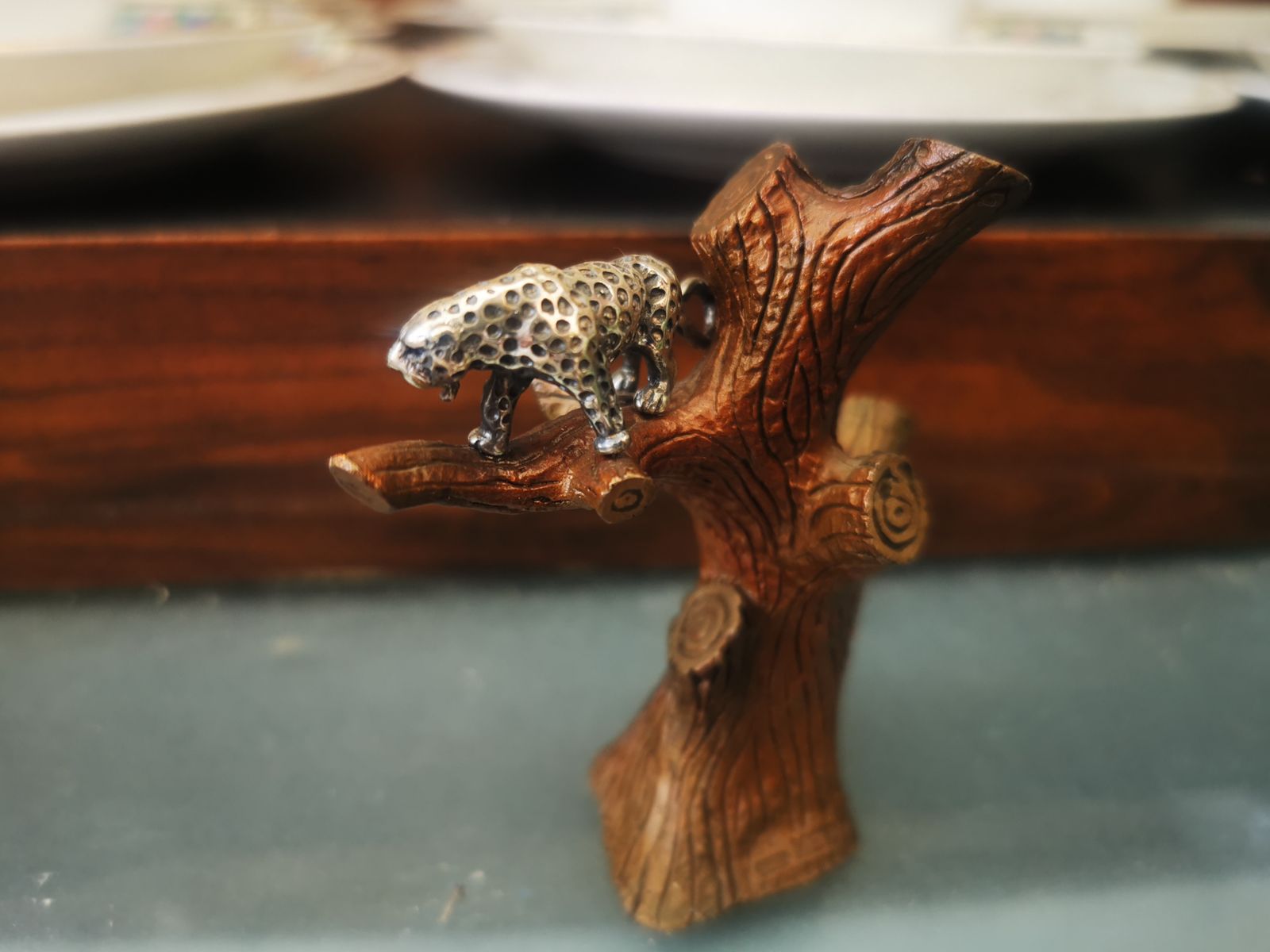 Miniature Metal Figurine Of Silver Leopard In Tree photo for sale