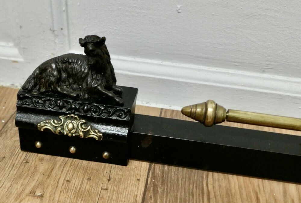A Brass And Iron Country House Fender With Mountain Goats photo for sale