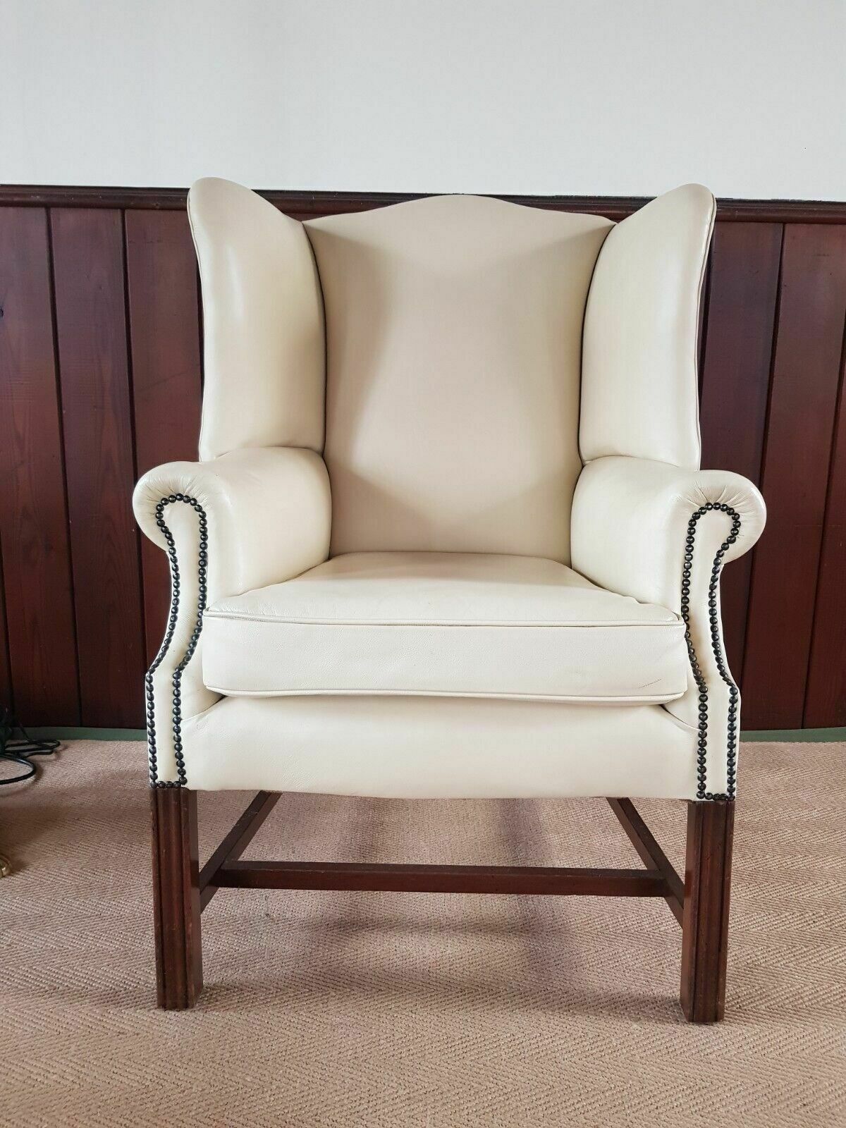 A Reupholstered Leather George III Style Wingback Armchair photo furniture
