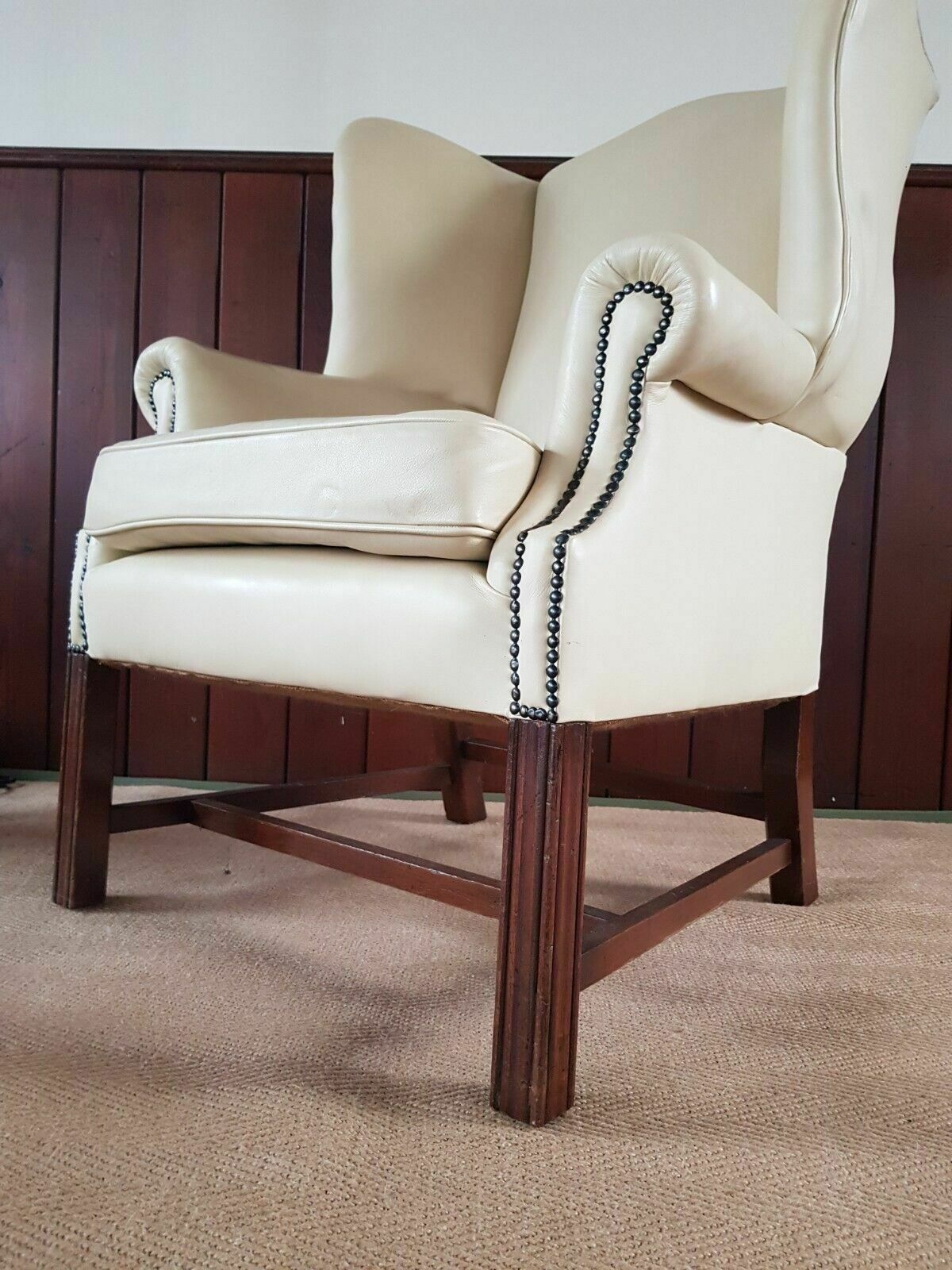 A Reupholstered Leather George III Style Wingback Armchair photo for sale