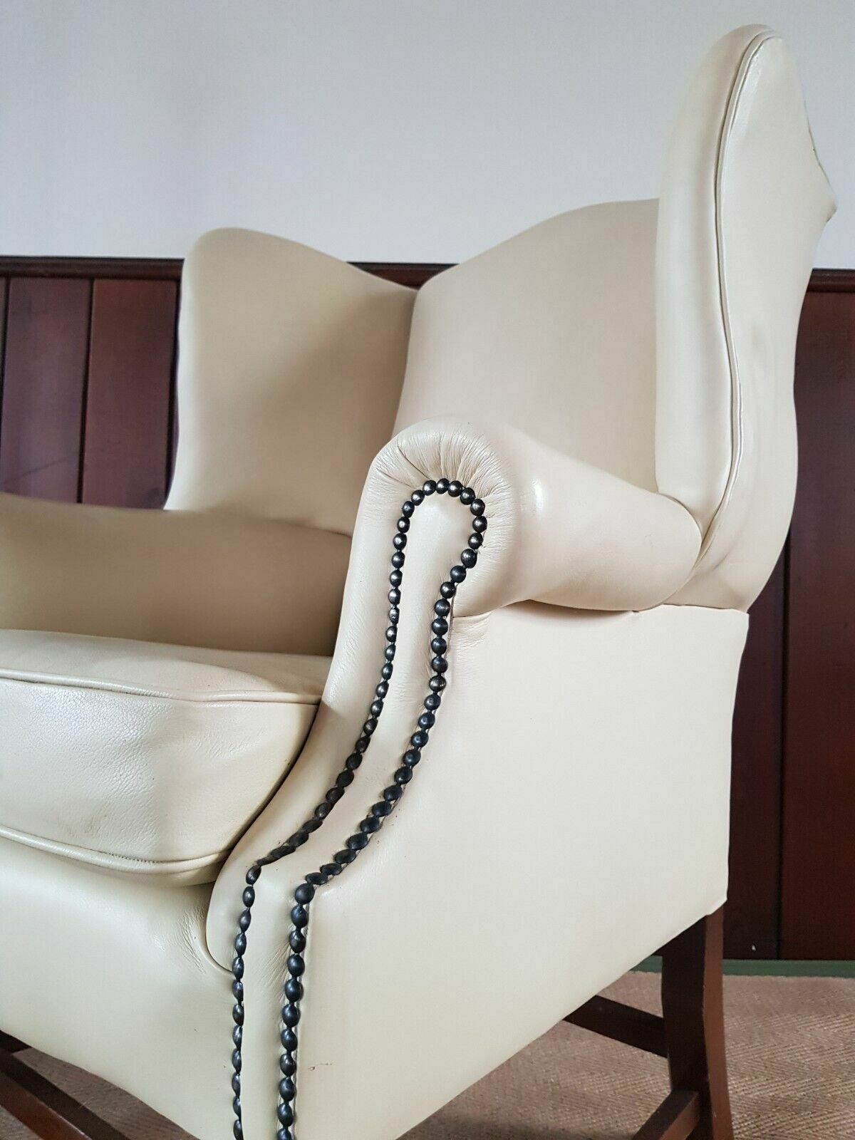 photo furniture A Reupholstered Leather George III Style Wingback Armchair