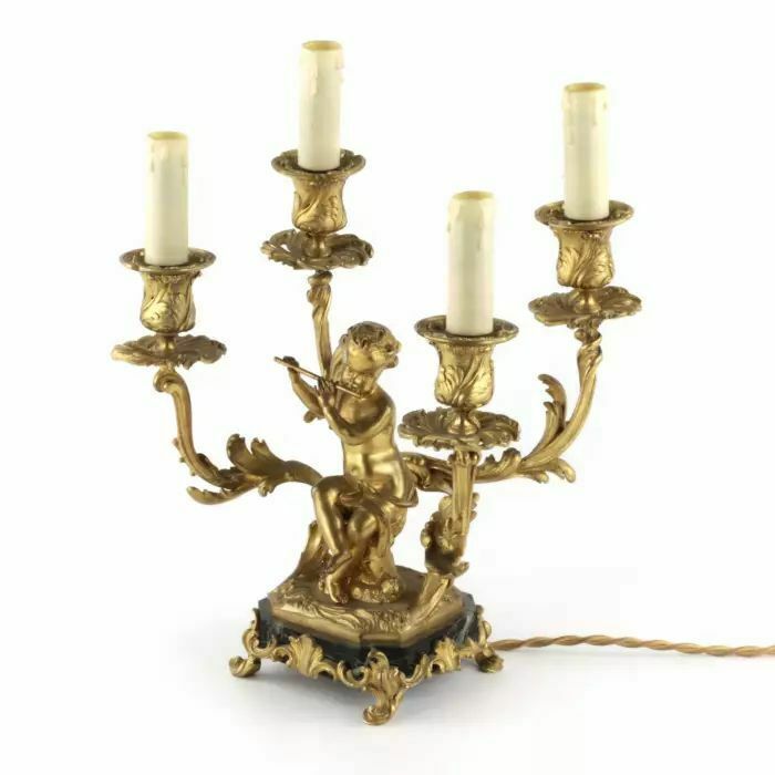 Paired Lamps Of Gilded Bronze With Cupids Playing Music photo vintage
