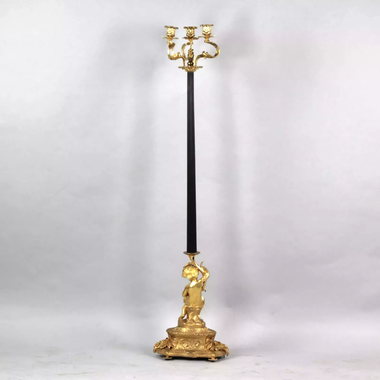 Bronze Floor Lamp With The Figure Of Putti. France. 19th Century. photo Lighting