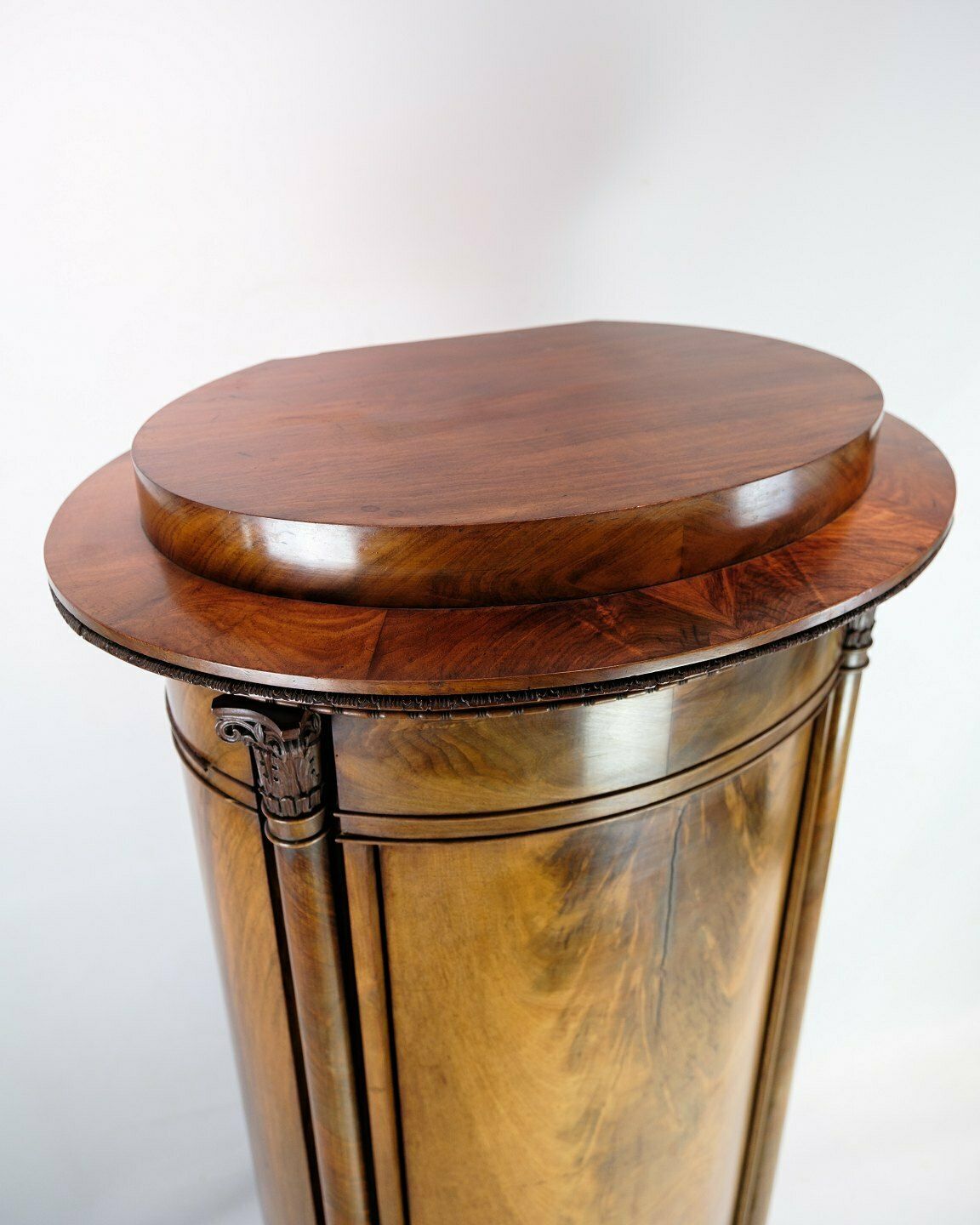 Oval Pedestal Cabinet With Mahogany Carvings From 1820s photo for sale