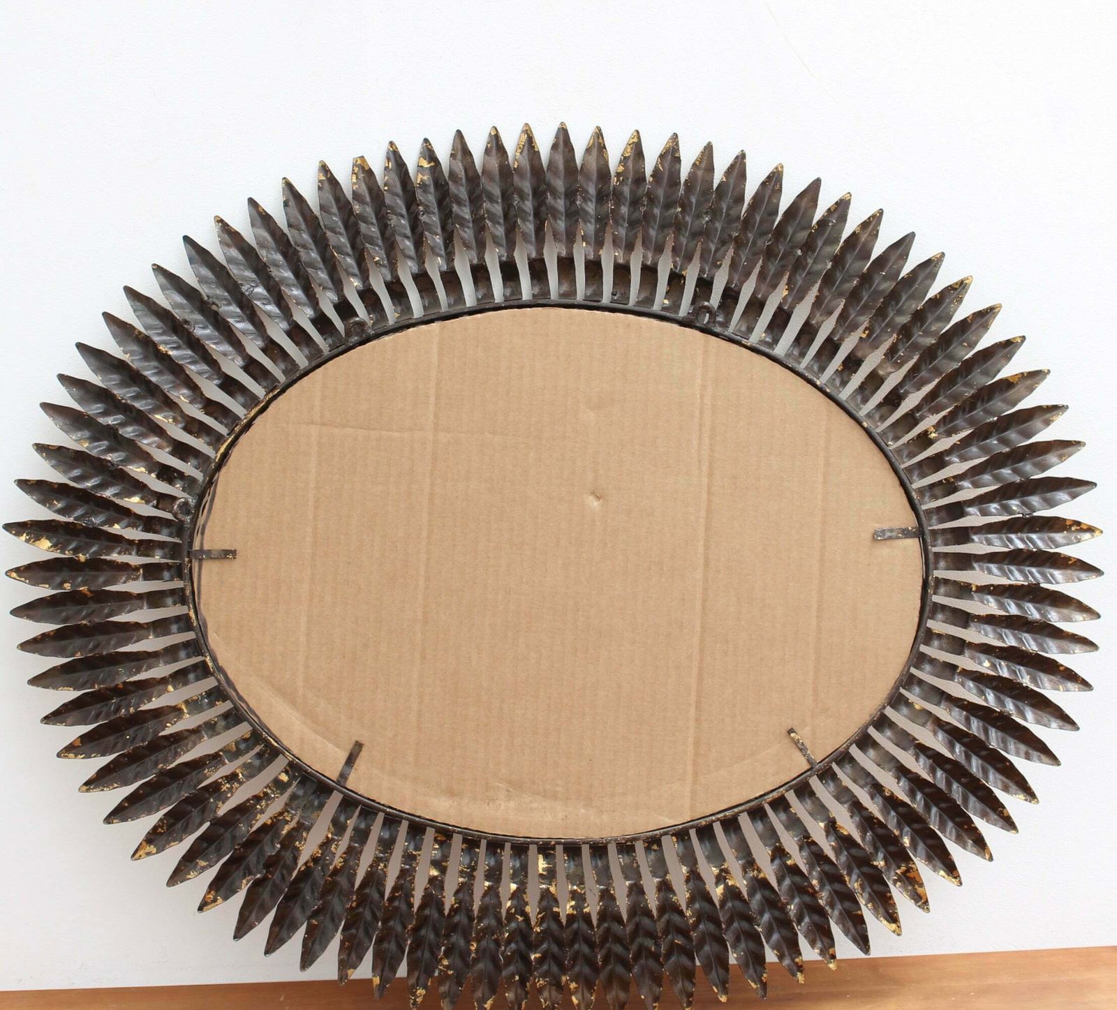 Mid Century Spanish Gilt Metal Sunburst Mirror With Leaf Motif, Circa 1960s. photo vintage