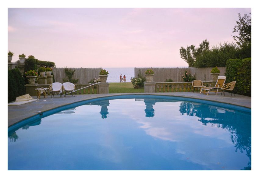 Sunset By The Pool By Toni Frissell Archival Pigment Print Framed In White photo furniture