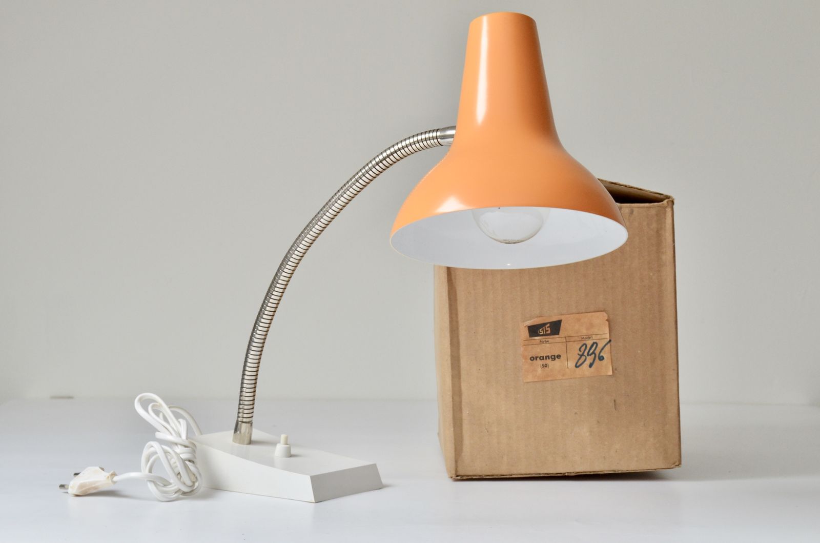 Lighting Vintage Metal Orange Desk Lamp By Sis Germany Model 38, 1970s New Old Stock photo