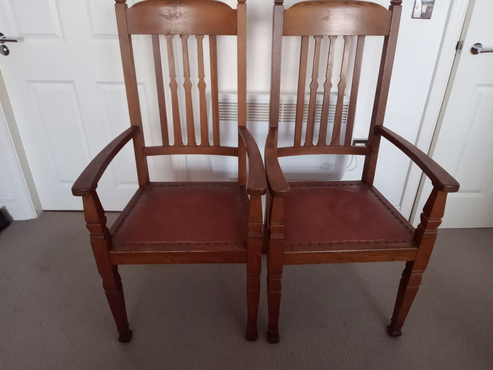 A Pair Of Oak Shapland And Petter Carver Chairs photo for sale